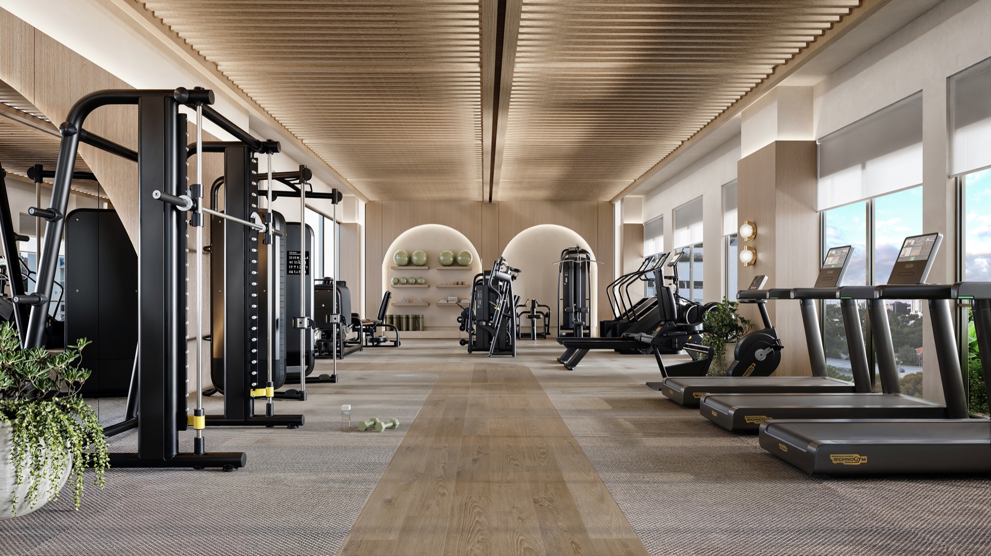 Technogym fitness center with cardio and strength equipment.